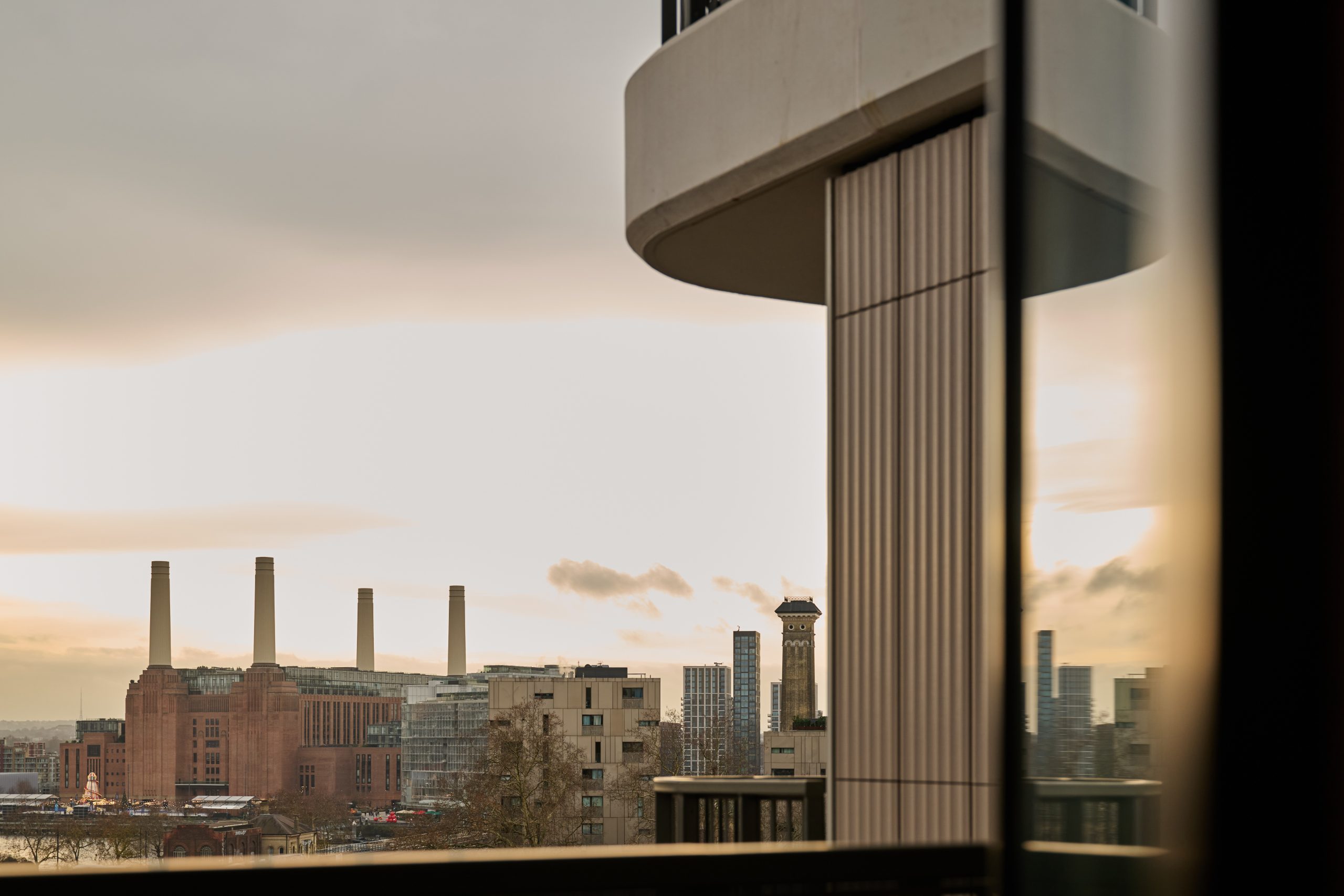 View from new apartment showing curved architecture of Sutherland Apartments, Ebury with Battersea Power Station in the far distance